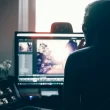 Freelancer using AI tools on laptop to improve productivity and grow online income in 2025